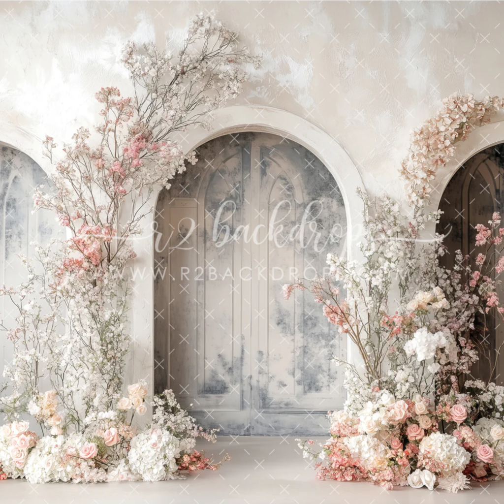 White floral arch backdrop for elegant Mother’s Day portraits in Gilroy studio
